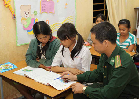 Soldier teachers give literacy lessons to highland children